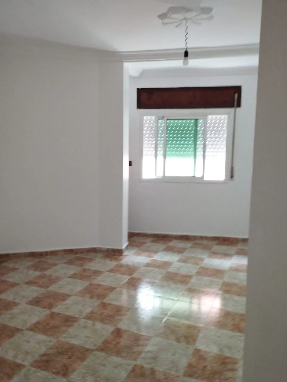 Appartement titré à vendre au troisième étage, composé de 2 chambres et un salon